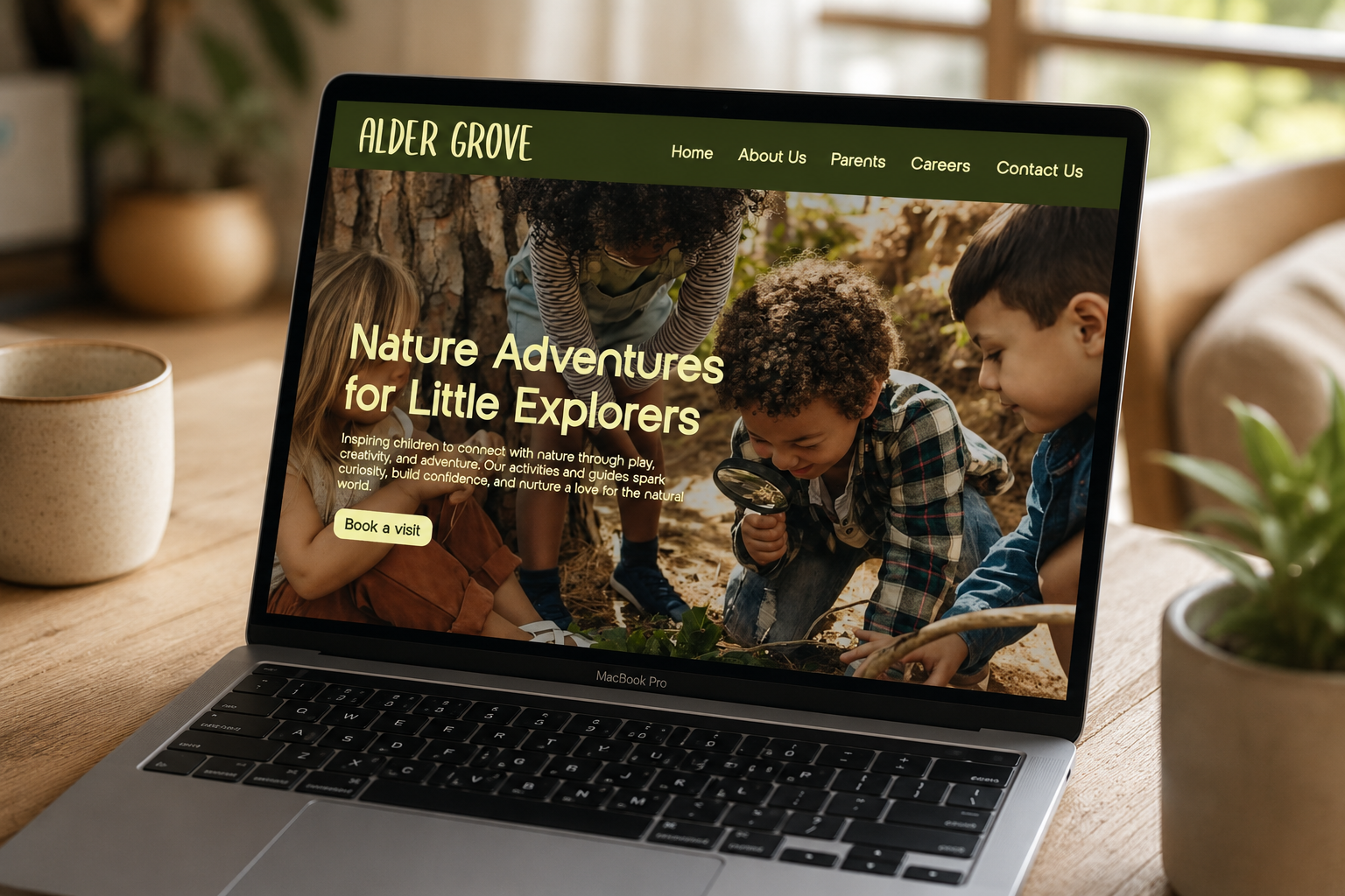 Alder Grove website on laptop